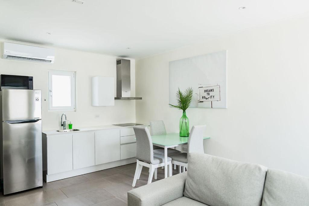 The Palm Leaf Apartments Noord Extérieur photo
