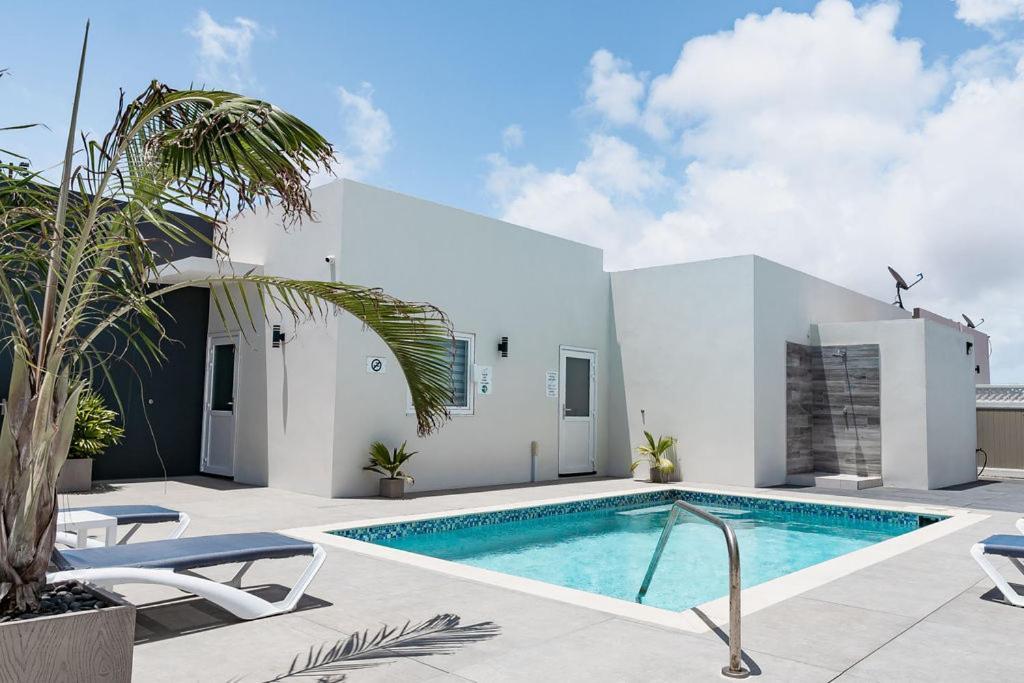 The Palm Leaf Apartments Noord Extérieur photo